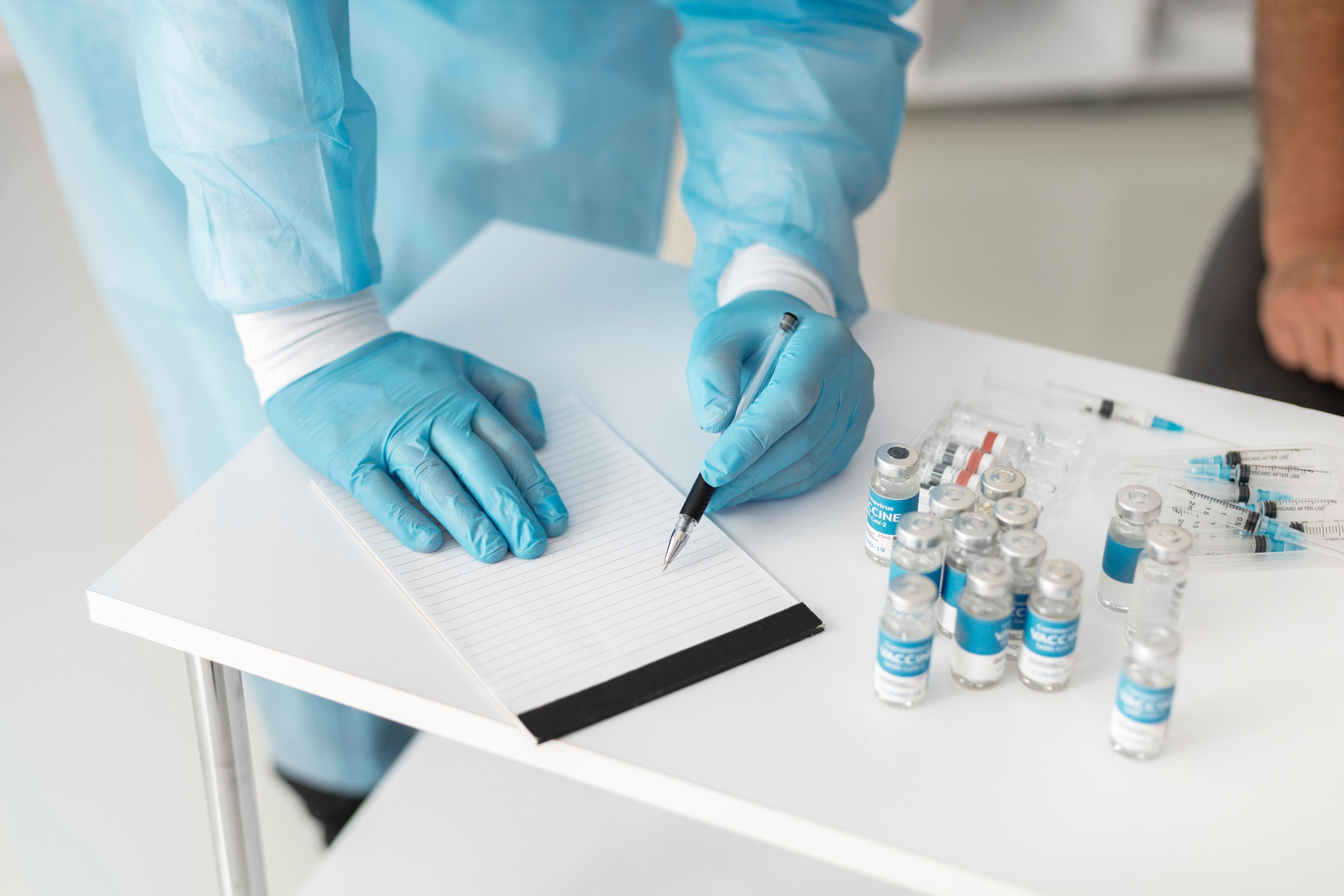 doctor-special-equipment-getting-ready-vaccinate-patient